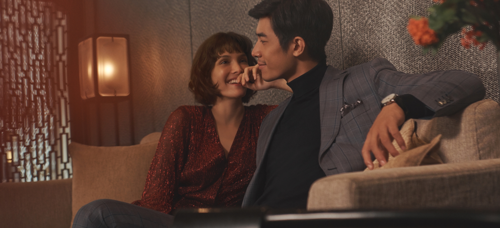 Couple sitting on couch