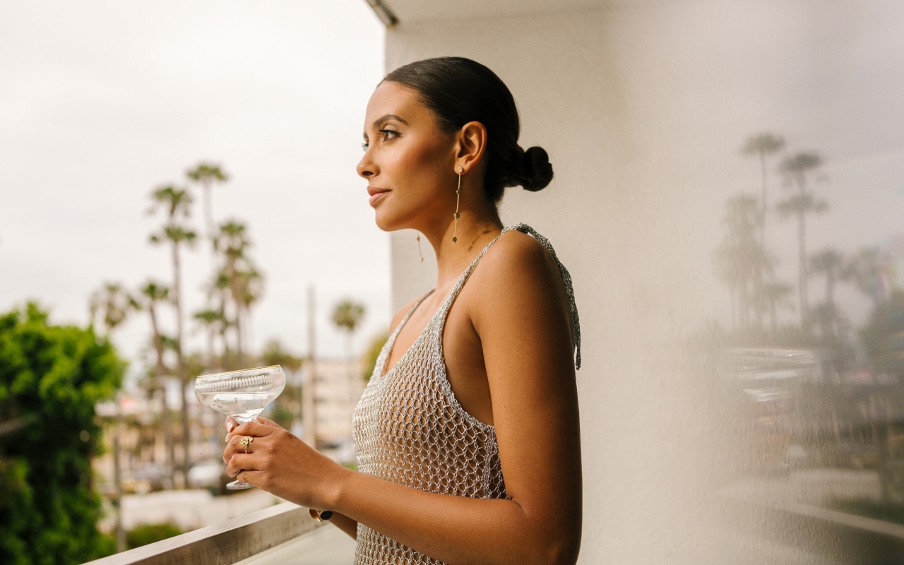 Woman viewing street from terrace