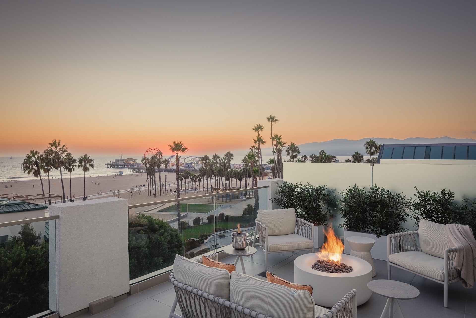 Ocean view outdoor seating with fire pit in Santa Monica