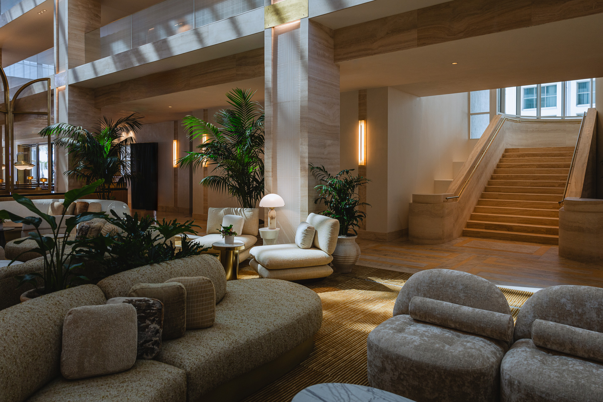 Stairs leading down to the lobby furniture