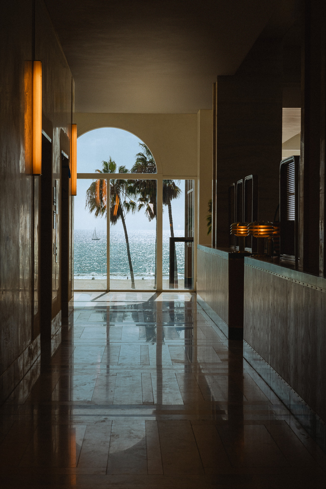 Hotel Lobby Hallway with views of palm trees