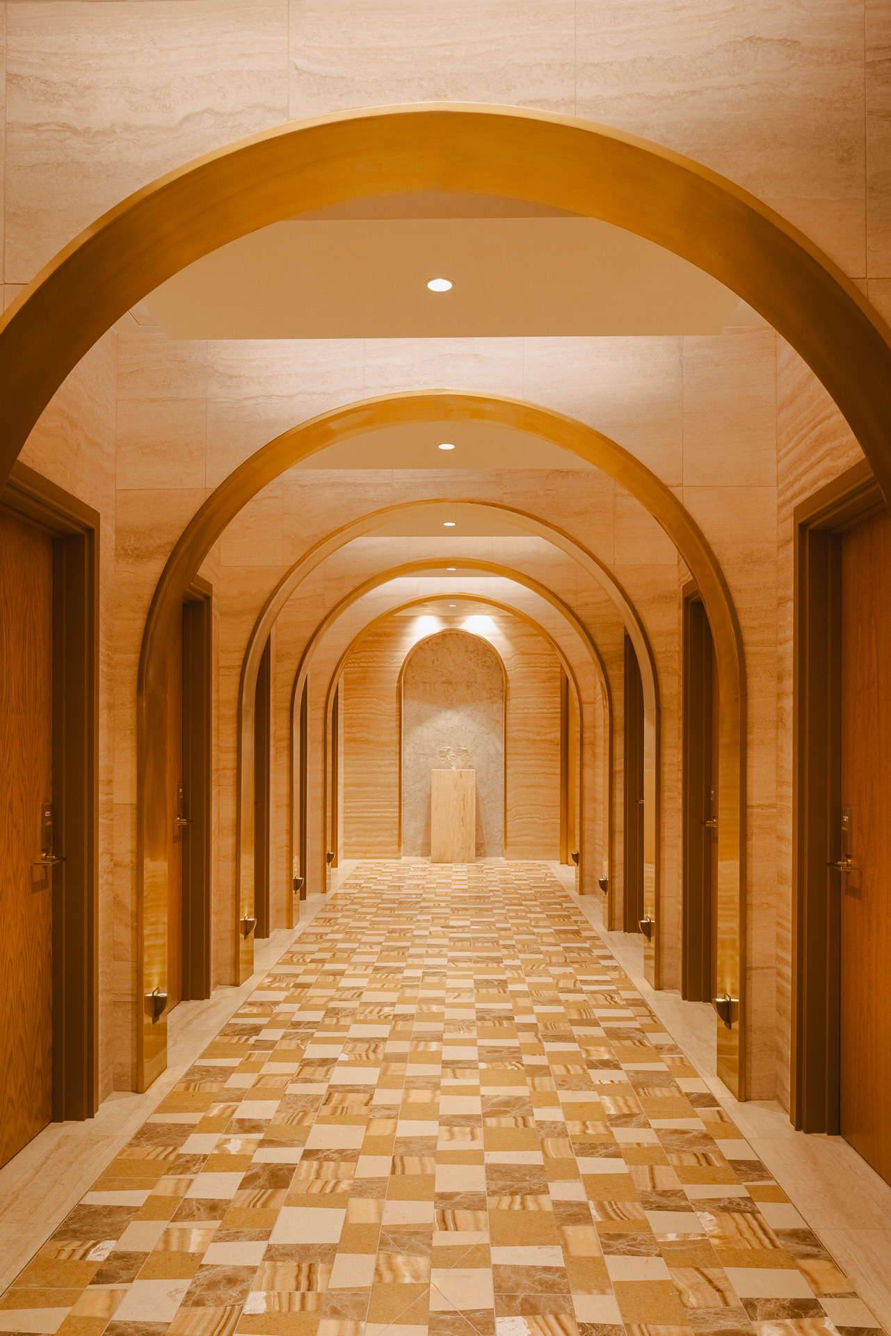 Long Hotel Lobby hallway with intricate mosaic tile floors