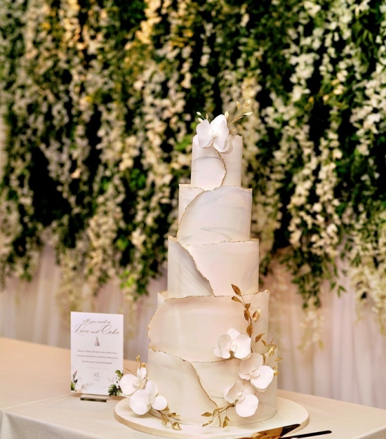 Luxury white wedding cake at coastal wedding at Regent Santa Monica Resort